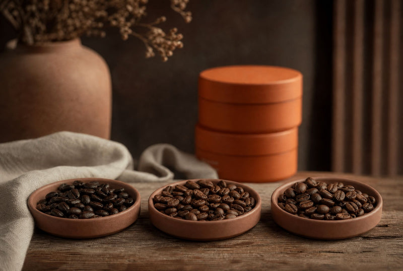 Three dishes of roasted beans side by side, caffeine in arabica robusta and Liberica